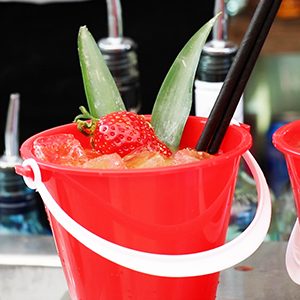 summer cocktails with fruits in glass